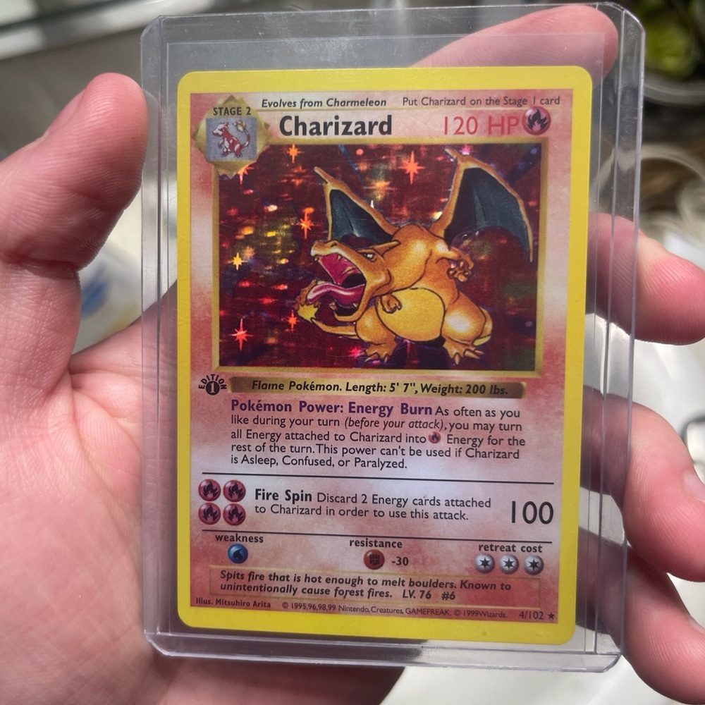 First edition charizard - Red and Yellow